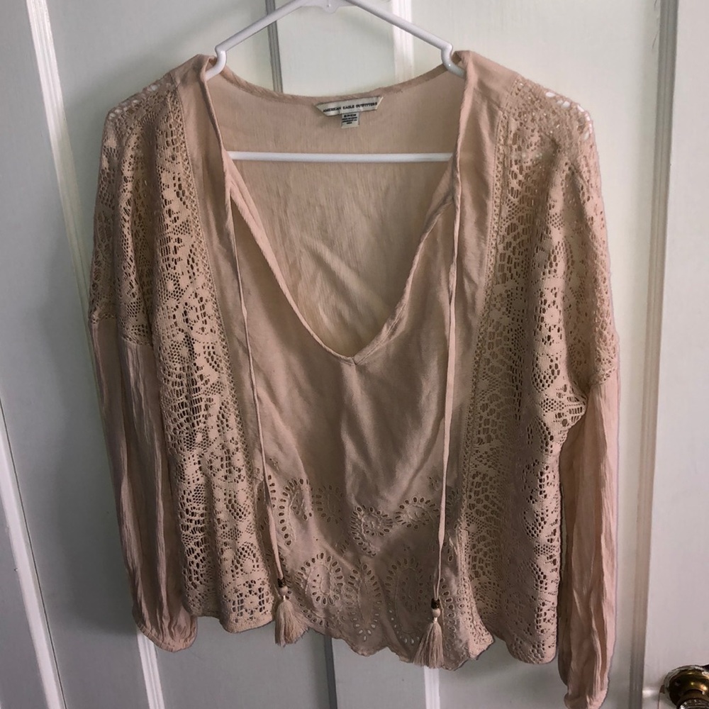 Woman’s Tasseled Blouse